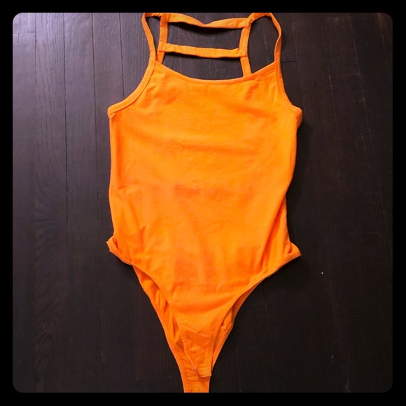 Body Central Tops - Body Central orange caged bodysuit